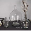 Effacer de grands vases de bouteille en verre ronds